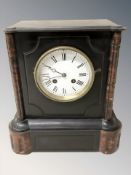A Victorian black slate and marble mantel clock,