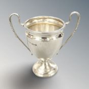 A silver twin-handled trophy cup, height 10 cm. CONDITION REPORT: 69.8g.