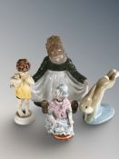 A Royal Copenhagen dish in the form of a seated girl, a Midwinter figure of a leaping rabbit,