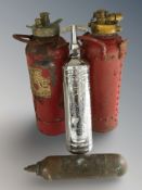 A group of vintage fire extinguishers including Pyrene.