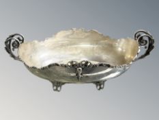 A Continental white metal twin handled table centre piece,