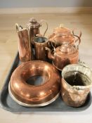 Copper kitchenalia including a Scandinavian bread mould, kettles, jugs, etc.