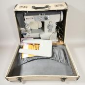 An Imperial electric sewing machine with lead.