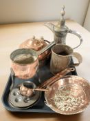 An Islamic coffee pot, together with other metal wares including a copper tea pot, tankard,