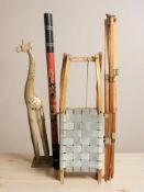 A vintage sledge, a collapsible easel, a didgeridoo and a wooden figure of a giraffe, height 107 cm.