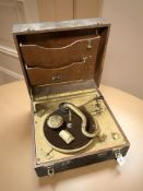 A vintage portable gramophone.