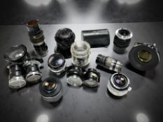 A collection of vintage camera lenses to include Nikkor-H Auto 1:3.