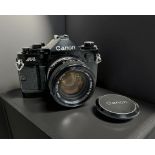 A Canon A-1 35mm film camera, with Canon FD 50mm 1:1.4 S.S.C lens.