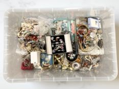 A large quantity of costume jewellery including some silver items,