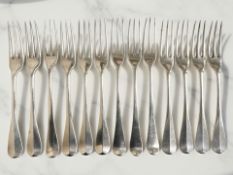 A harlequin set of thirteen Georgian and Victorian silver table forks, four by John Faux,