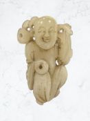 An antique Chinese pale jade figure of deity, probably Qing dynasty,