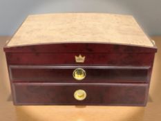 A contemporary burr wood effect jewellery casket, width 47 cm.