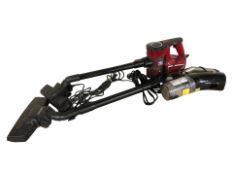 Two stick vacuum cleaners.