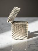 A silver vesta case with gadrooned decoration, height 4.5cm CONDITION REPORT: 21.