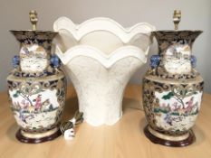 A pair of contemporary oriental ceramic lamp bases, height excluding shades,