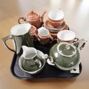 An Art Deco coffee service and a Japanese export tea set decorated with dragons.