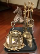 A metal figure of a prancing horse, an Art Nouveau easel picture frame, a mirror,