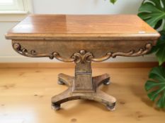 A Victorian mahogany turnover top tea table,