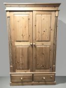 A modern pine double door wardrobe,