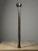 An African carved hardwood knobkerrie, length 60 cm.