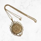 A St George pendant in gold mount on chain, both stamped 375 CONDITION REPORT: 3.