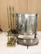 A chrome fire screen and two brass companion sets