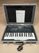 A Korg Opsix Altered FM synthesizer, in flight case with power lead and instruction manual.