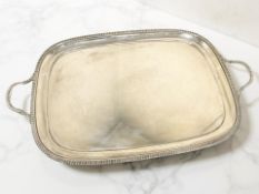 A George V silver twin-handled tray, Martin Hall & Co, Sheffield 1919, 67 cm x 41 cm.