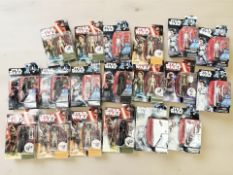 A group of Hasbro Disney Star Wars figurines.