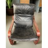A Scandinavian stained bentwood and black leather lounge chair
