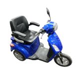 A Veleco electric mobility tricycle, with two keys and charging lead.