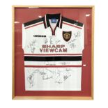 A framed and signed Manchester United football shirt, size M, 1997-1999 away shirt,