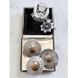 Three Celtic pewter brooches, stamped St Justin,