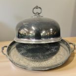 An EPNS domed entrée cover, together with a twin-handled gallery serving tray, width 52 cm.