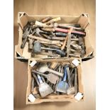 A quantity of vintage hammers, chisels and other tools.