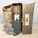 A group of artificial Christmas trees