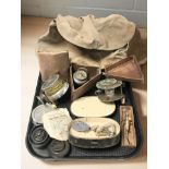 A group of vintage fishing reels, flies, a canvas bag, etc.