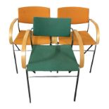 A set of six chrome framed and bentwood armchairs in orange upholstery and a further matching chair