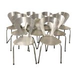Nine brushed metal chairs