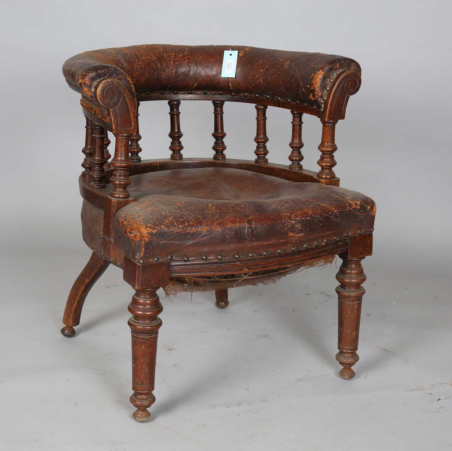 A late Victorian oak framed tub back desk chair, upholstered in brown leather, height 74cm, width - Image 2 of 11