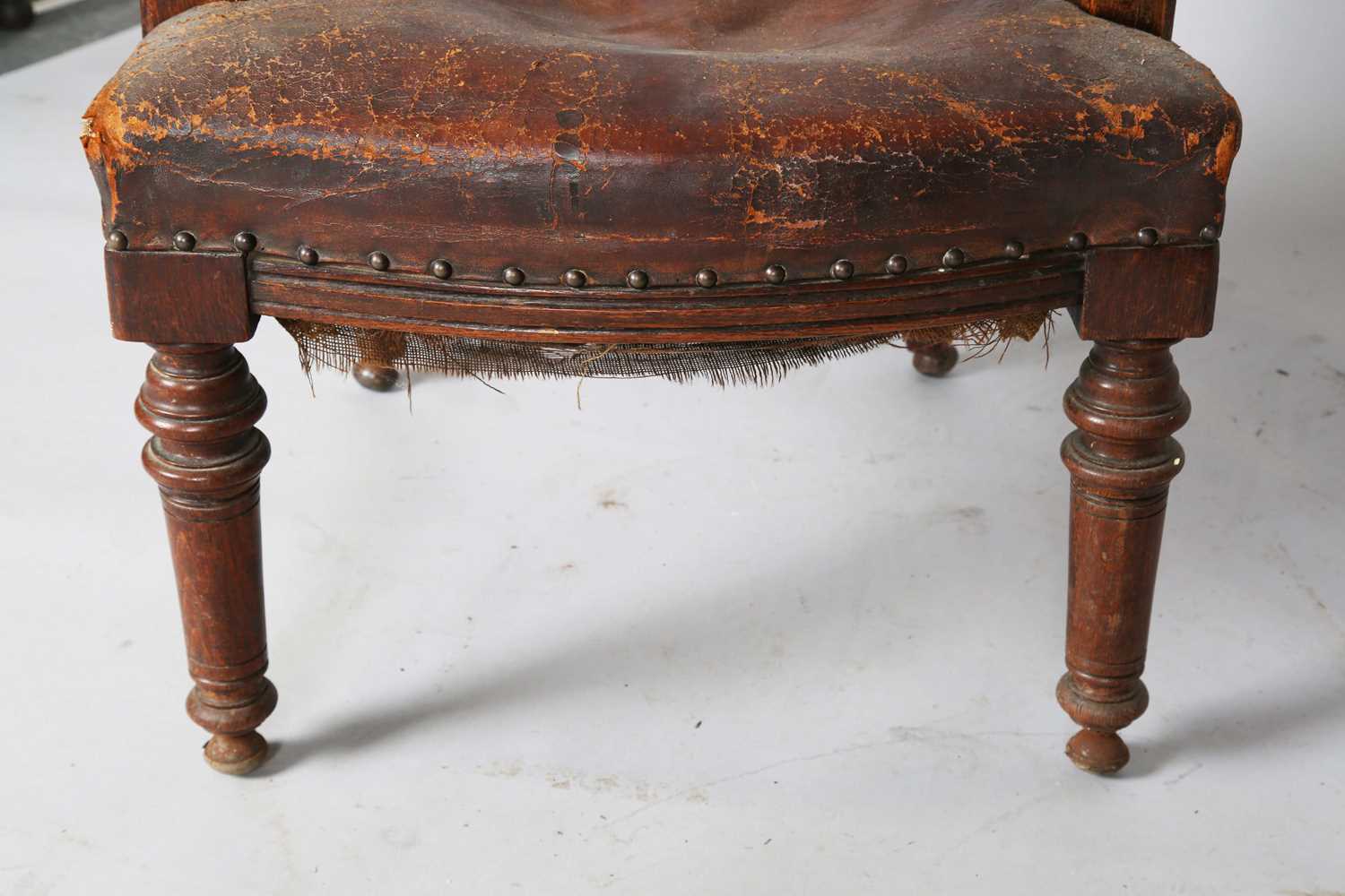 A late Victorian oak framed tub back desk chair, upholstered in brown leather, height 74cm, width - Image 8 of 11
