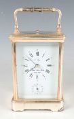 A late 20th century French silver plated corniche cased carriage alarm clock by L'Epée,
