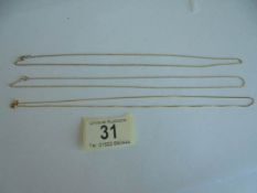 Three fine 9ct gold neck chains, 3.6 grams.