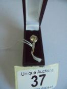 An 18ct gold and platinum diamond set ring, size N, 2.56 grams.