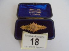 A Victorian 9ct gold brooch in original case, 3.7 grams.