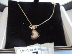 A 14ct gold diamond heart and butterfly pendant, 3.3 grams.