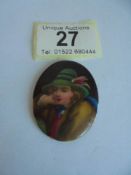 A hand painted miniature portrait of a lady on porcelain.