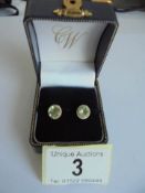 A pair of 18ct gold and aquamarine earrings. 2.35 grams