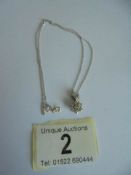 A white gold 1 carat diamond pendant on a 9ct white gold chain. 3 grams.