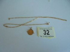 A 9ct gold chain (clasp a/f) and a 9ct gold pendant, 4.3 grams.